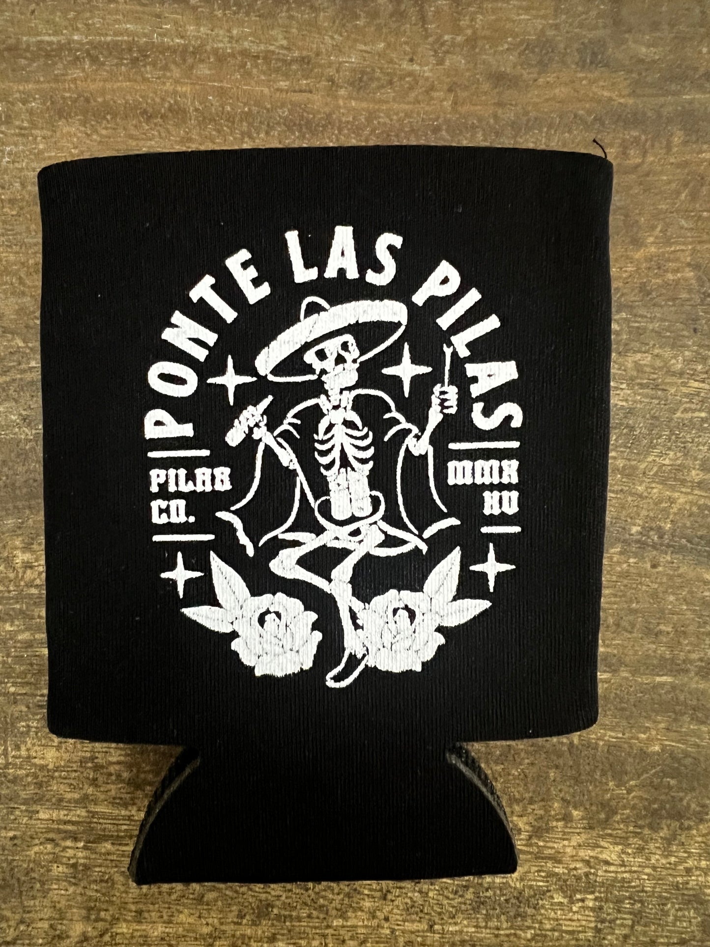 Pilas Co Muevete dancing skeleton beer koozie - Latino workwear brand motivational drink cooler