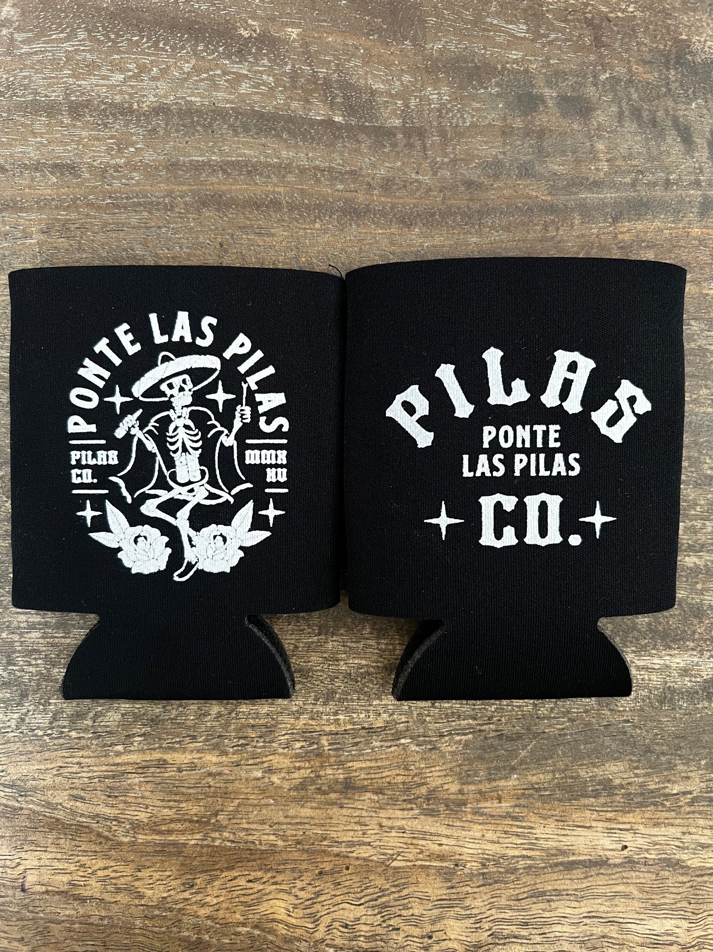 Pilas Co Muevete beer koozie front and back - dancing skeleton and Ponte Las Pilas Latino drink cooler