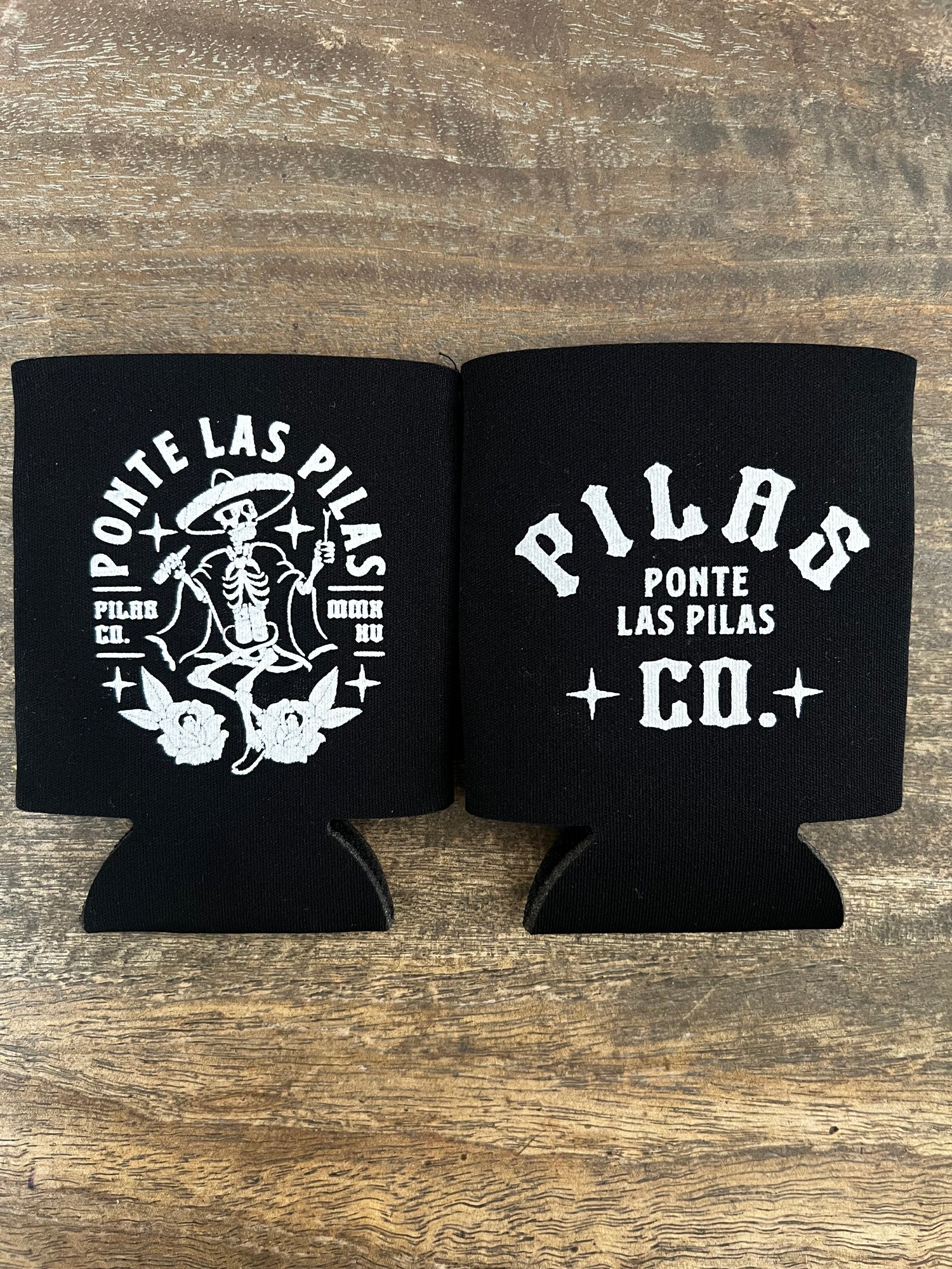 Pilas Co Muevete beer koozie front and back - dancing skeleton and Ponte Las Pilas Latino drink cooler