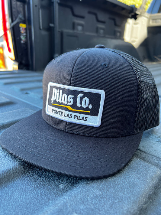 Pilas Co Ponte Las Pilas trucker hat in work truck - black mesh snapback for Latino construction workers